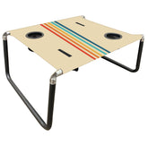 Neso Beach Table setup on sand provides a stable surface for snacks and drinks.