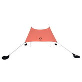 Neso Grande beach tent folded for transport, lightweight shade on the go.