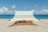 Neso Grande beach tent setup demonstrates quick shade for family beach day.