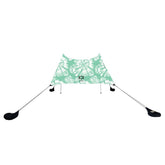 Neso Grande mint tie-dye beach tent open, offering wide shade and UPF 50+ sun protection.