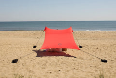 Neso Lehua Red sand anchor usage shows stable shade near the surf.