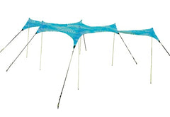 Neso Aqua Fronds beach setup demonstrates sand anchoring for quick shade.