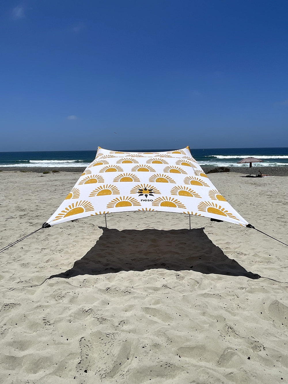 Neso sun shelter 7x7ft setup for easy beach shade on the go.