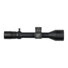 Nightforce NX8 50mm objective lens highlighting light transmission in dim conditions.
