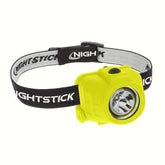 Nightstick XPP-5452G headlamp worn on helmet enables hands-free work in hazardous environments.