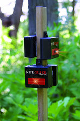 Nite Guard Solar predator light installed on fence deters wildlife along property