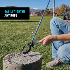 Nite Ize CamJam SlideLock attached to tarp grommets for quick, reliable tensioning