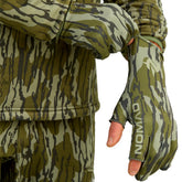 NOMAD fingerless turkey glove in Mossy Oak Bottomland for precise turkey calls