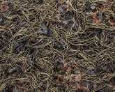North Mountain Gear universal camo netting close-up ghillie texture for woodland brown concealment.
