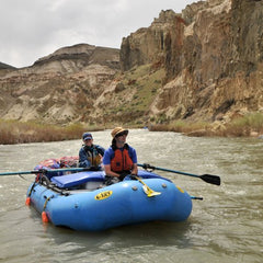NRS Cooler Mounts keep heavy items off the raft floor for safer storage.