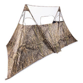 Nukem Grab & Go panel in Mossy Oak Habitat XL blending with brush for concealment.