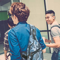 Nupouch Anti-Theft Daypack water-resistant fabric protects essentials in light rain.