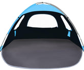 NXONE beach tent with UV-protection shield for sunny beach days.