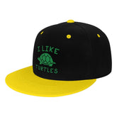 OCALL I Like Turtles snap back hat front view, bold yellow for sunny outdoor days.