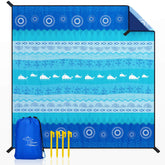 OCOOPA Bohemian Beach Blanket full setup shows spacious lounging area for family on the beach.