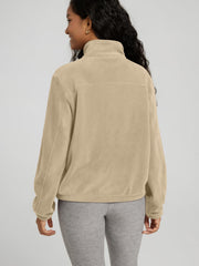 ODODOS polar fleece jacket sandstone pocket detail for secure essentials.