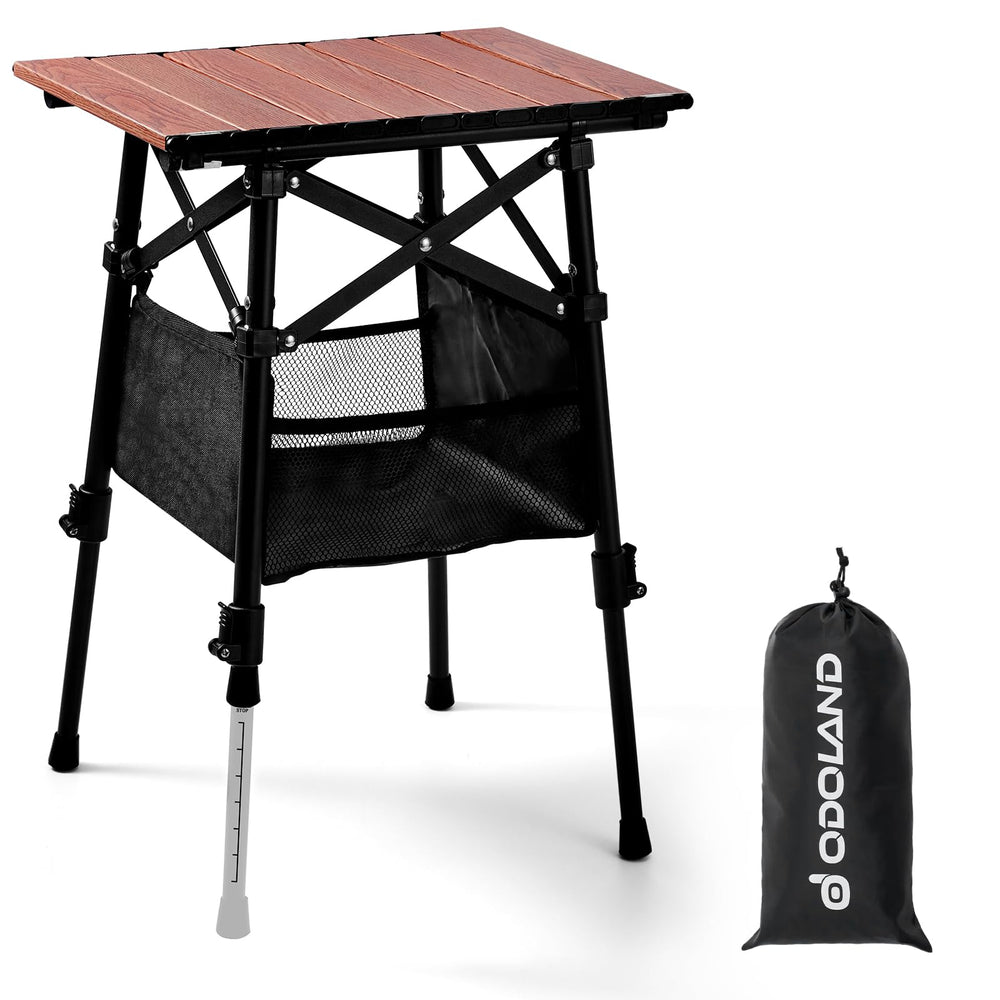 Odoland folding camping table with adjustable-height legs for stable setup on uneven ground.