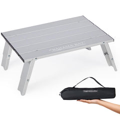 Old Bahama Bay Ultralight Mini Table set up on sand for easy beach snacks