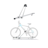OMAC car roof bike carrier mounted on a vehicle for easy transport.