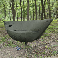 Onewind windsock warms and comforts campers during cold nights in the hammock.
