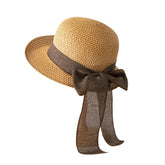 OnIUeZky ladies sun hat with a wide brim for sun protection at the beach.