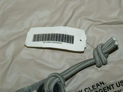 ORC USGI tarp ACU foliage sand grommets and snaps close-up, secure anchoring potential.