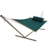Original Pawleys Island hammock assembled in green soft weave for two-person lounging