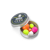 Oros 6-pack strike indicators in orange, pink, chartreuse, and white colors displayed in a metal tin