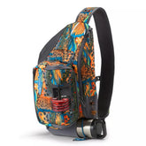 Orvis fly fishing sling pack front view with organized pockets for quick gear access