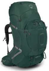 Osprey Aether Plus 85L backpack on trail showing balanced carry for heavy loads.