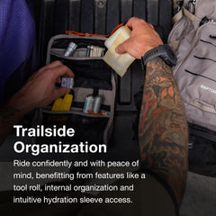 Winged shoulder harness stabilizes the pack during aggressive riding.