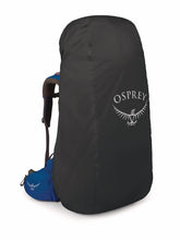 Osprey Ultralight Raincover on a black backpack, front view, weather-ready protection.