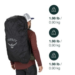 Side view of the raincover fitted to a large pack in wet conditions.