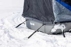 OTTER Sled Anchor Kit quick-release straps securing a sled on icy wind