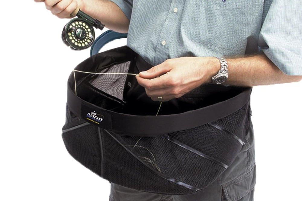 Outcast waist stripping basket keeps lines organized while wading.