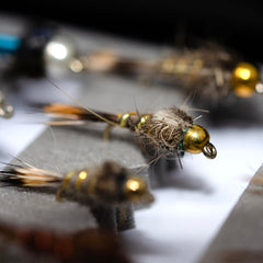 Outdoor Planet streamers and Wooly Buggers attract trout and bass in different water conditions.
