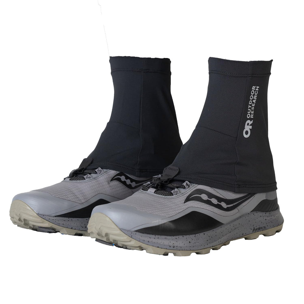 Outdoor Research Swift Run Gaiters close-up strap demonstrating secure trail fit and water resistance.