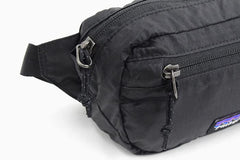 Patagonia Ultralight Black Hole Mini Hip Pack compact storage stowable in larger bags