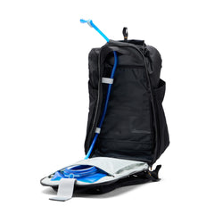 Peak Design Outdoor Backpack 25L hydration sleeve in use supports on-the-go hydration on trails
