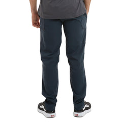 Pelagic Palomar elastic waist pants dark navy side profile showing stretch.