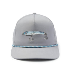 Pelagic Upswell Stick Em Mid Crown Trucker side view highlighting water-repellent fabric and lightweight comfort.