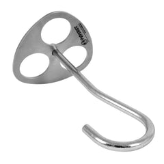 Petromax tripod over open flame enables versatile camp cooking setups.