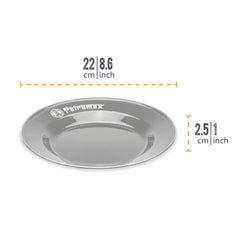 Petromax enamelware plate on a camping table with a black finish for outdoor meals