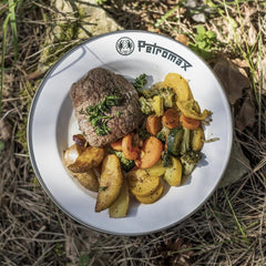 Petromax enamelware plate 10.2-inch diameter ready for hot meals on trail