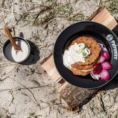Petromax enamelware plate close-up of its 7 inch diameter ideal for travel meals.