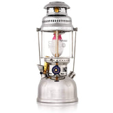 Petromax HK500 lantern fully assembled on a camping table, bright light for camping and emergencies