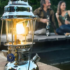 Petromax HK500 polished brass lantern side view suitable for home emergencies.