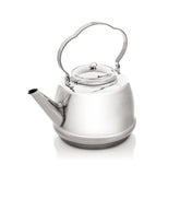 Petromax teakettle over an open fire for fast boiling and aroma-rich tea