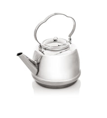Petromax teakettle over an open fire for fast boiling and aroma-rich tea