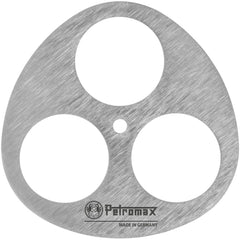 Petromax chain provides adjustable heat control for even cooking over campfire flames.